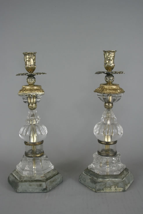 Baroque style rock crystal and vermeil candlesticks