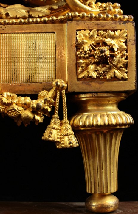 Pair Louis XVI ormoulu chenets with original gilding