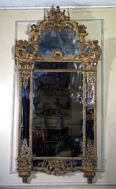 Rgence carved and gilded mirror