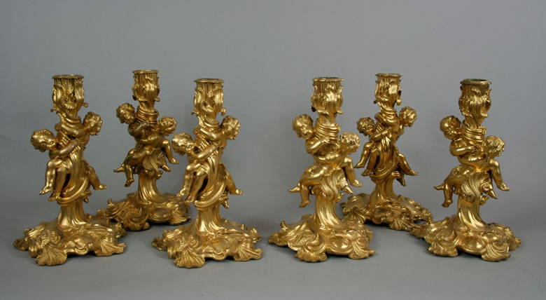 Meissonier set of six candlesticks