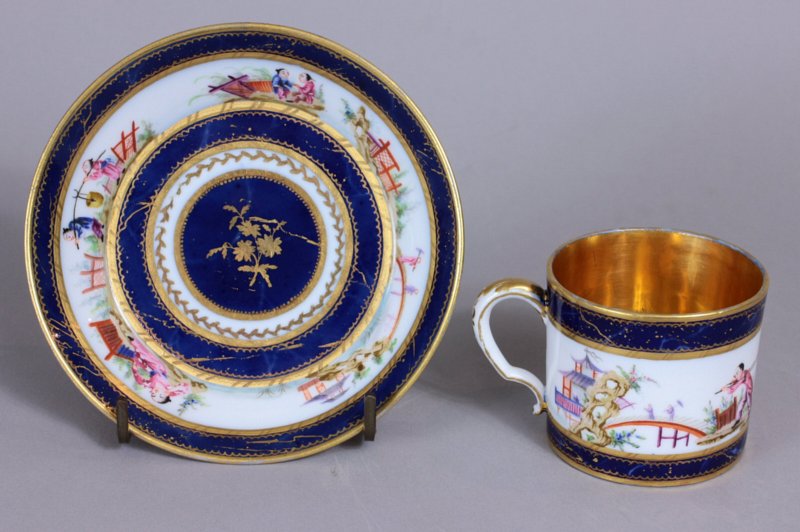 Sevres Chinoiserie cup and saucer decorated on all surfaces