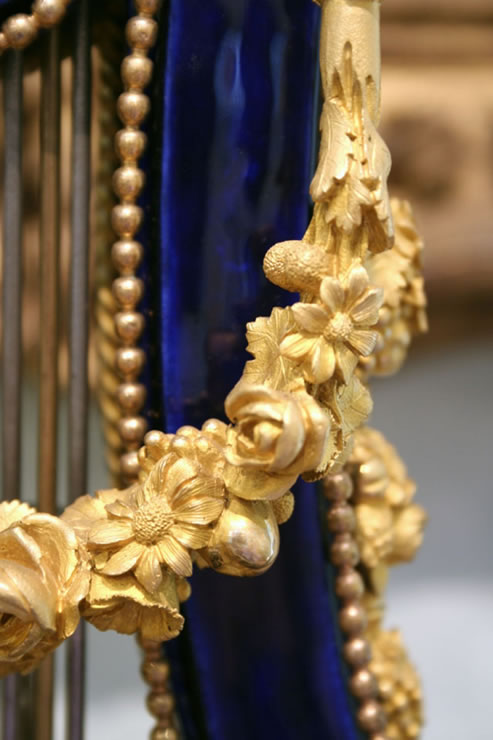 Louis XVI lyre clock in Svres cobalt blue porcelain