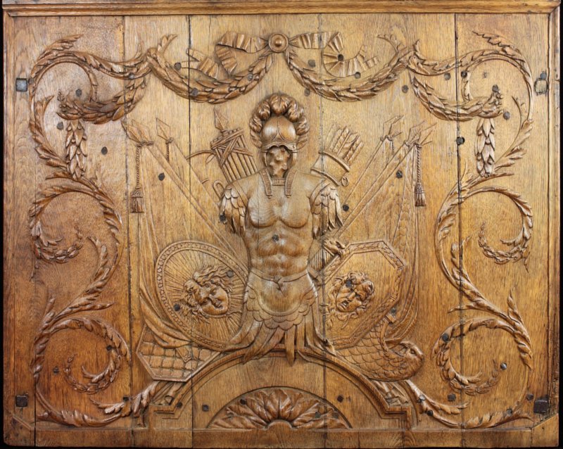 Neoclassical oak boiserie panel with military trophy