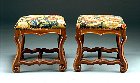 Pair of os de mouton Louis XIV walnut tabourets covered with old needlepoint