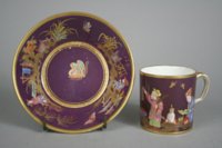 Purple ground chinoiserie cup and saucer